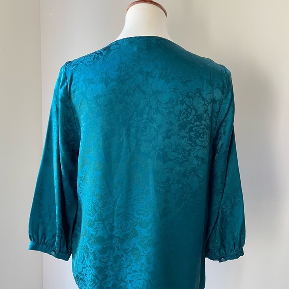Pretty teal silk like F21 blouse with 3/4 sleeves and covered buttons. - Picture 2 of 6